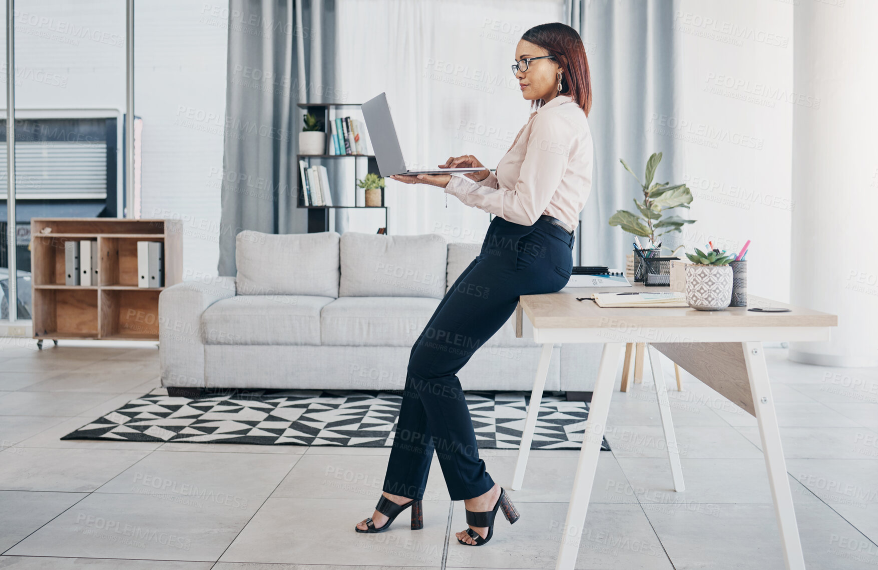 Buy stock photo Woman in modern office with glasses, laptop and reading email, HR schedule and online report feedback. Website, networking or communication on digital app, businesswoman at human resources agency