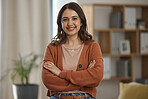 Happy woman, portrait and arms crossed of creative professional, freelancer or ambition at home. Female person smile in confidence, pride or proud for remote work or startup in living room at house