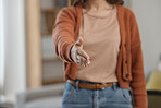 Creative woman, handshake and meeting for introduction, welcome or startup partnership at home. Closeup of female person shaking hands for greeting, b2b or deal in agreement, teamwork or thank you