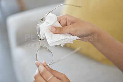 Buy stock photo Hands, person and cleaning vision glasses with tissue for lens protection, sight and eye care safety at home. Closeup, cloth and wipe dirt on clear spectacle frames, eyewear and eyesight for wellness