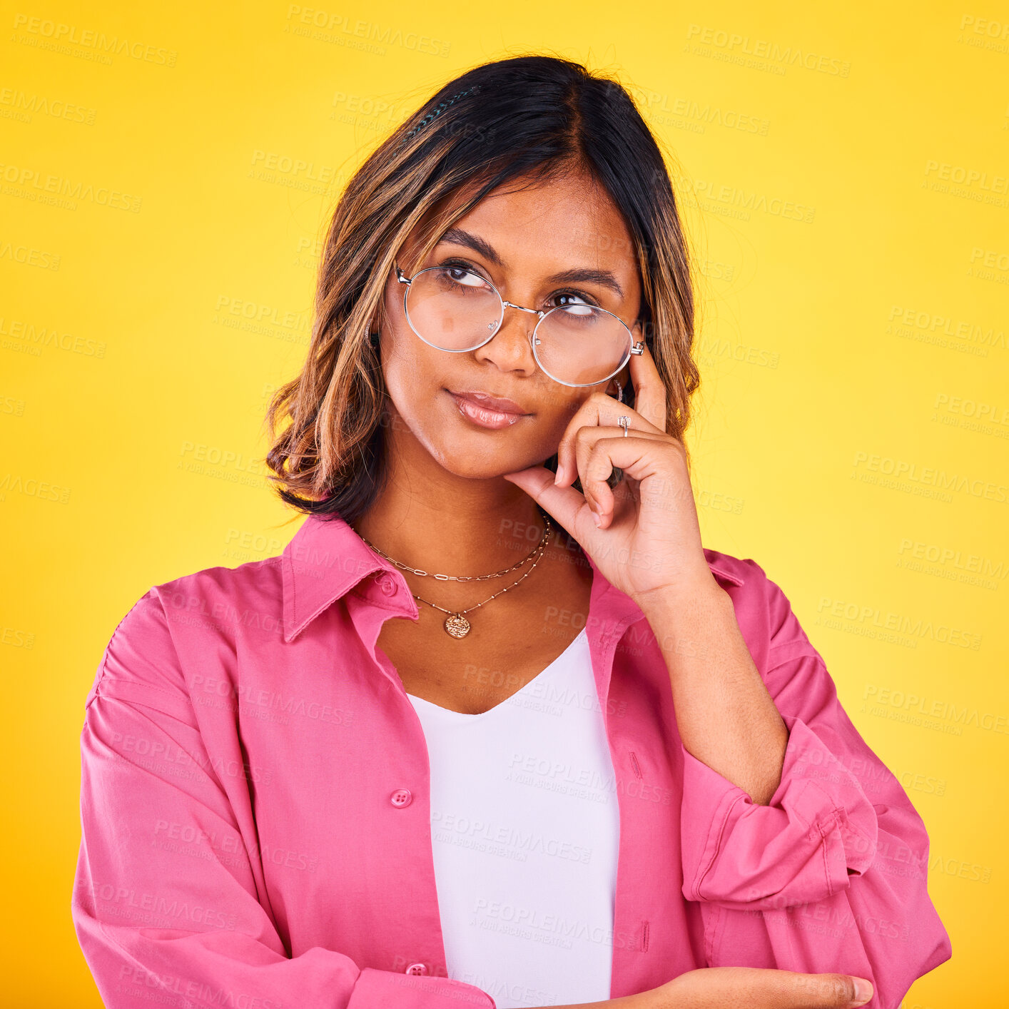 Buy stock photo Woman, thinking and vision on yellow studio background for decision making, solution and inspiration for future choice. Indian, mindset for planning and thoughtful girl with idea, face and reasoning