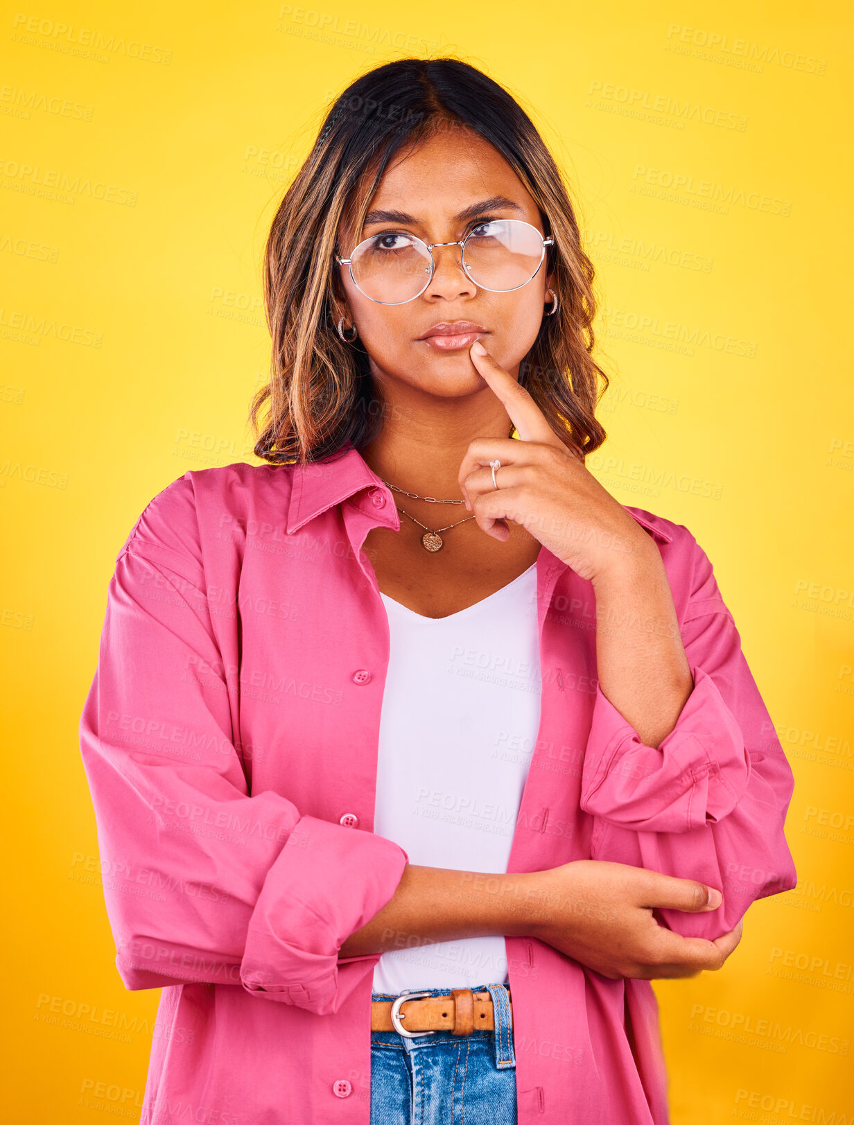 Buy stock photo Thinking, idea and face of woman on yellow background with fashion, confidence or thought. Inspiration, style and isolated person with attitude in trendy clothes, stylish outfit and glasses in studio