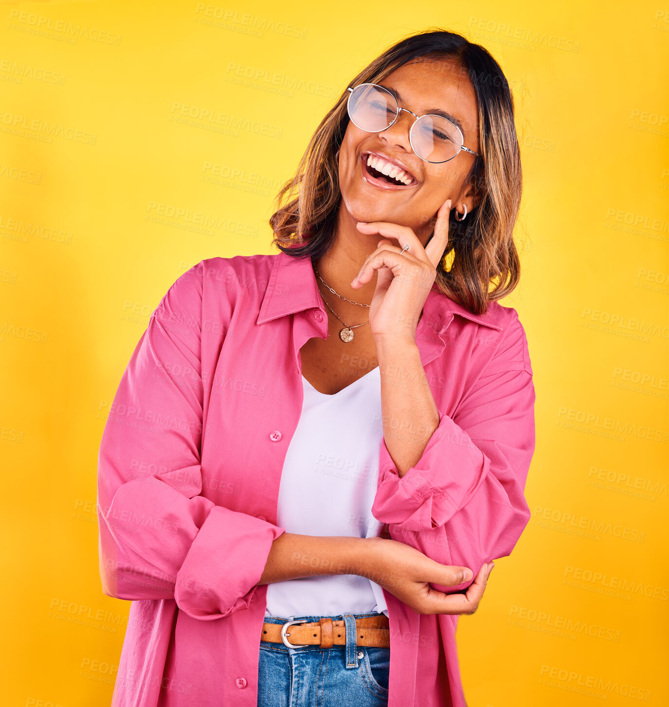 Buy stock photo Happy, laugh and face of woman on yellow background with smile, laughter and cheerful. Fashion, style and isolated person with funny joke in trendy clothes, stylish outfit and glasses in studio