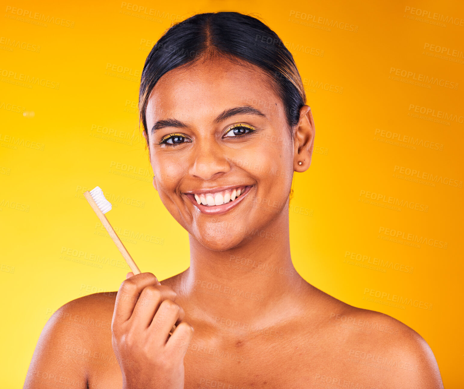 Buy stock photo Woman, toothbrush in portrait with smile and dental in studio, health and wellness on yellow background. Bamboo brush, eco friendly orthodontics and teeth whitening for oral care and fresh breath