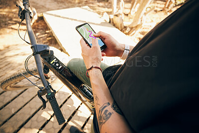 Buy stock photo Cycling, hands and man with phone, map or location search in park for training or extreme sports closeup. Smartphone, zoom and guy biker on app for direction, route and forest, path or off road guide