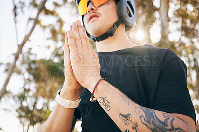 Buy stock photo Man, hands and prayer with hiking in nature, mindfulness and meditation with bike by mountain. Caucasian guy, athlete and gratitude with mental health in forrest, natural landscape and vacation

