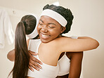 Hug, women and happiness in locker room for training and celebration with fitness, sports and workout. Support, black girl and friend embrace for motivation and smile with performance and lifestyle
