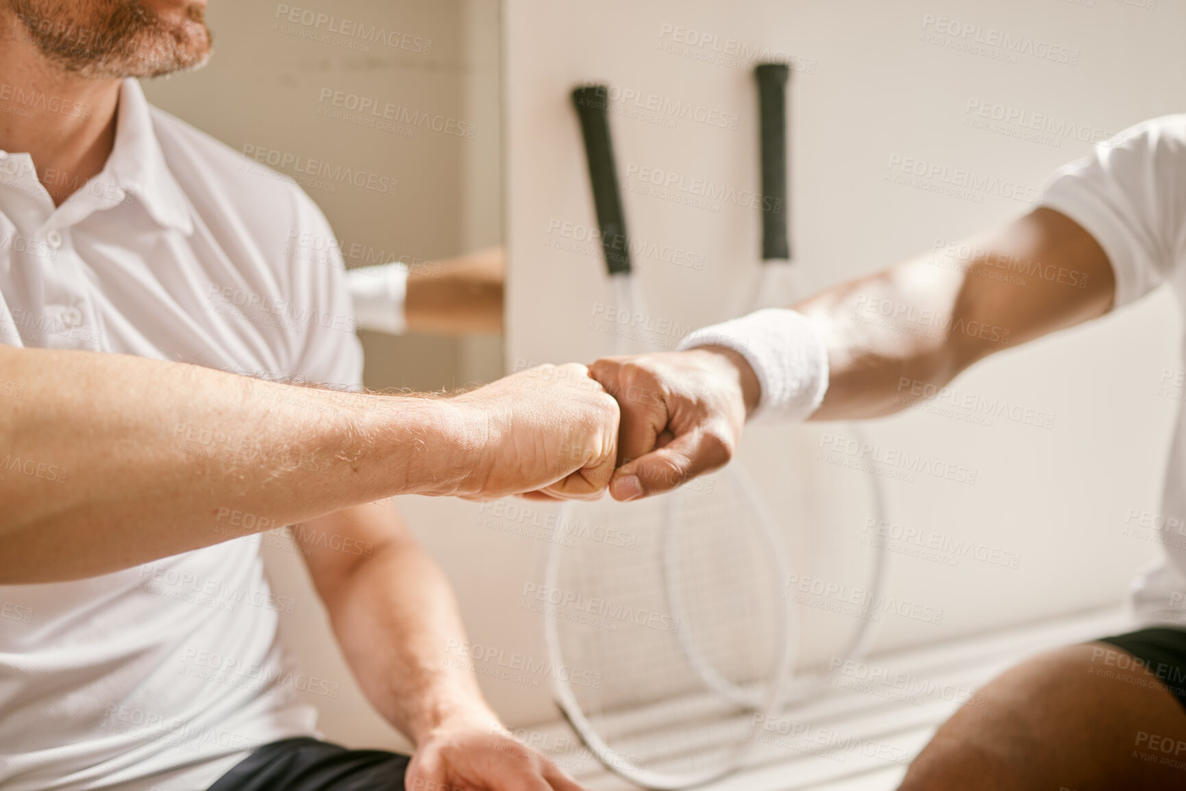 Buy stock photo Sports, hands and fist bump by men friends at indoor tennis court for support, motivation or training closeup. Zoom, emoji and people with fitness deal, workout or partnership agreement or solidarity