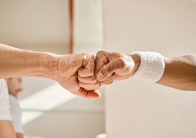 Buy stock photo Fitness, hands and fist bump by men friends at indoor tennis court for support, motivation or training closeup. Zoom, emoji and people with sports deal, workout or partnership agreement or solidarity
