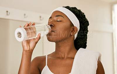 Buy stock photo Tennis, health and woman drinking water, fitness and tired with workout, fatigue or exercise. African person, athlete or player with bottle with liquid, aqua or wellness with training or sports