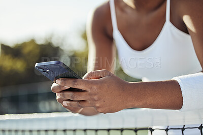 Buy stock photo Tennis, woman hands and phone text outdoor for sport, fitness and workout with social media at net. Exercise, match training and mobile networking with website and online app on court for wellness