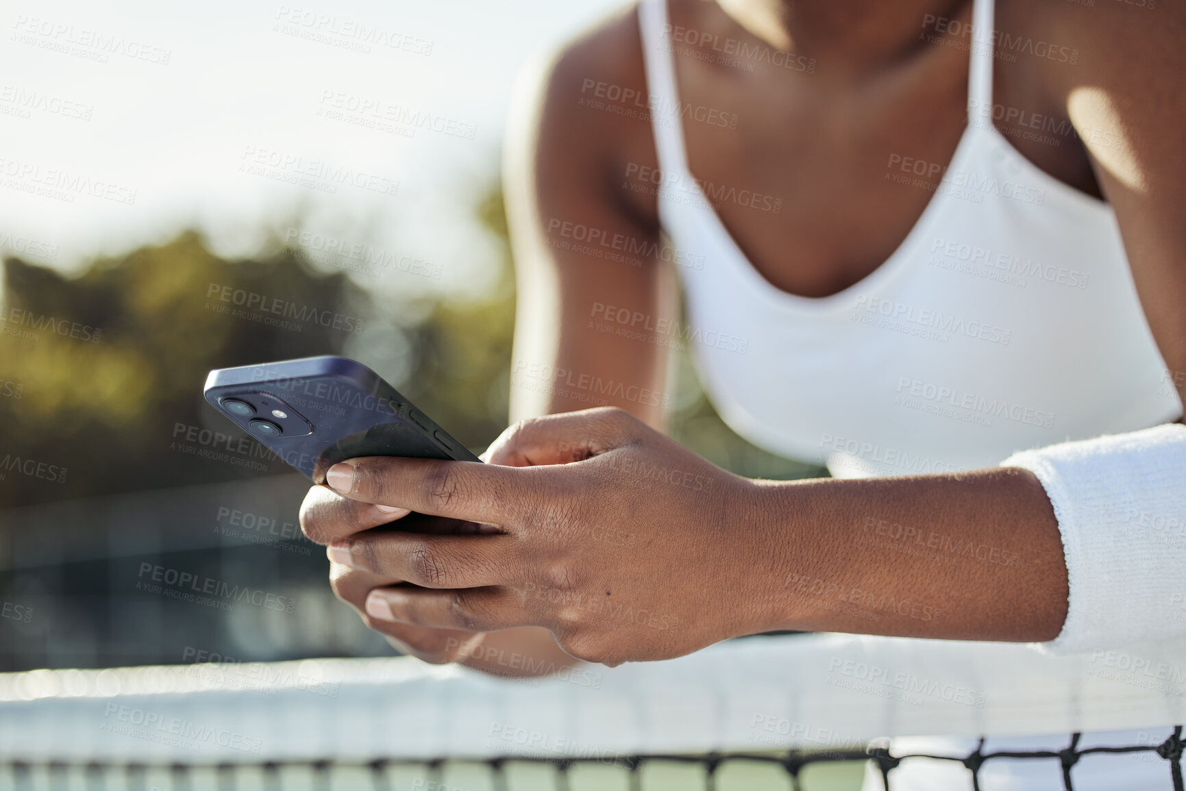 Buy stock photo Tennis, woman hands and phone text outdoor for sport, fitness and workout with social media at net. Exercise, match training and mobile networking with website and online app on court for wellness