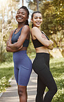 Fitness, nature and portrait of women in park for running exercise for race or marathon training. Sports, workout and female athletes with crossed arms doing cardio workout together in outdoor field.