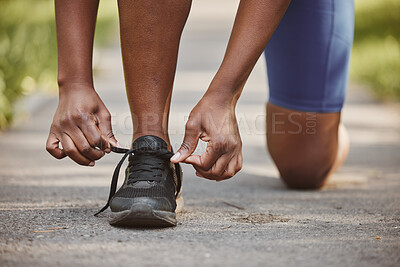 Buy stock photo Person, hands and tie shoes in fitness getting ready running exercise or outdoor cardio workout. Closeup of athlete or runner tying shoe on asphalt in preparation for training or run at the park