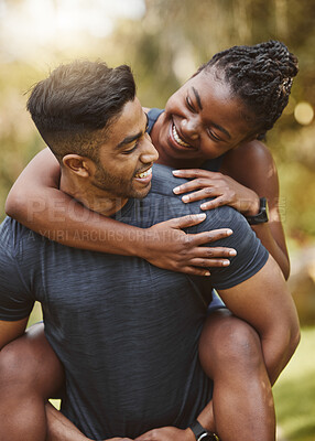 Buy stock photo Fitness, nature and couple piggy back outdoors for exercise, training and running for cardio workout. Dating, happy and interracial man carrying woman for wellness, healthy body and sports in park