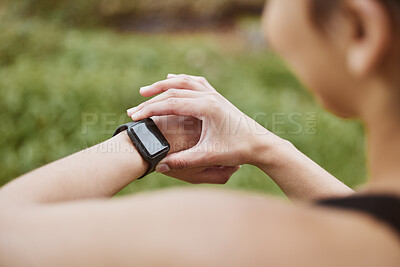 Buy stock photo Hands, runner girl and check smart watch in park for steps, data or time app with results, fitness or nature. Woman, iot clock or monitor for speed, sport or reading for exercise, workout or health
