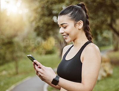 Buy stock photo Woman, smile and phone on run, nature and digital by message, notification. Happy person, trail and exercise for fitness, sportswear and sweat in outdoors, workout and health by cardio, break and fit