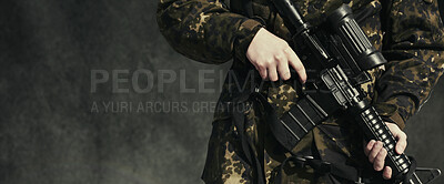 Buy stock photo Soldier, war and holding a gun, closeup and mockup for army, military and camouflage for survival. Warrior, violence and crime by hands, battle and and danger on battlefield, safety and training