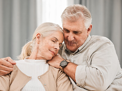 Buy stock photo Old people, hug and relax on sofa with love and support, bonding while at home with trust and comfort. Couple with time together, marriage or life partner with retirement, calm and peace of mind