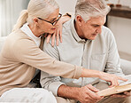 Old couple, Bible study and Christian faith with worship and reading book, wellness and spiritual together in retirement. Bonding over religion, people at home with gospel and scripture, God and pray