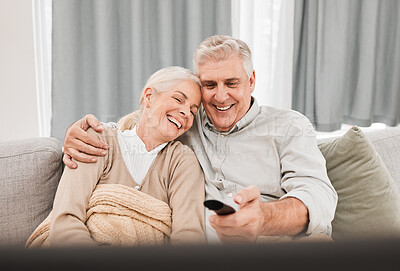 Buy stock photo Senior couple, tv and laughing with love on a living room sofa with smile and movie at home. Elderly people, bonding and marriage in retirement with series and streaming in lounge on a couch together