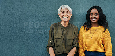 Buy stock photo Smile, portrait and women by a wall with mockup space for advertising, promotion or marketing. Happy, team and interracial female people standing together together by gray background with mock up.