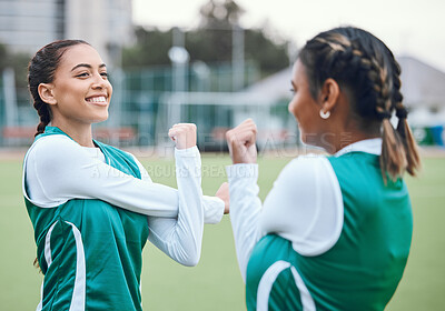 Buy stock photo Hockey, fitness and women stretching in team training, practice or sports workout exercise on turf. Teamwork, smile or happy female athlete with flexibility ready to start a game in warm up together