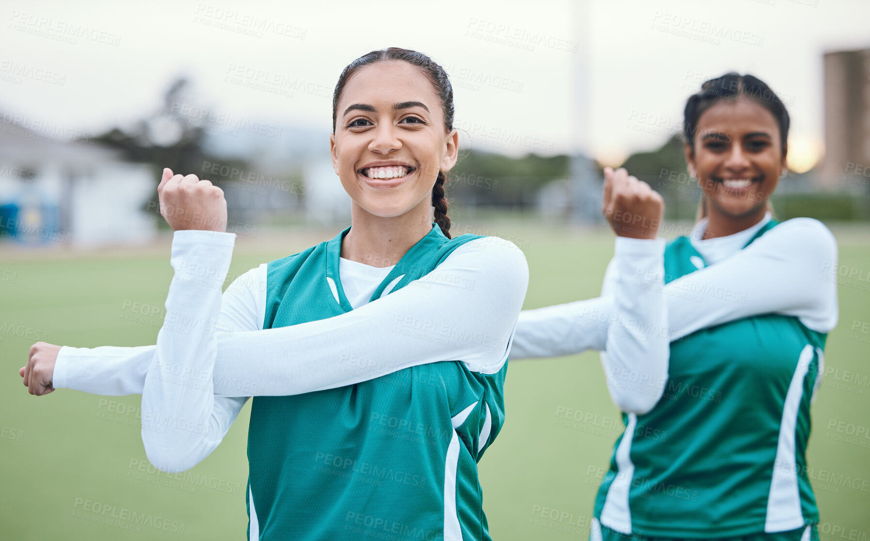 Buy stock photo Sports, team and portrait of stretching arms on field with women in soccer or exercise with happiness outdoor. Football player, woman and training with a smile on face for fitness practice or match