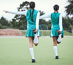 Hockey, sports or team stretching legs in training, practice or fitness workout exercise on turf together. Teamwork, back or  healthy athletes women with flexibility ready to start a game in warm up