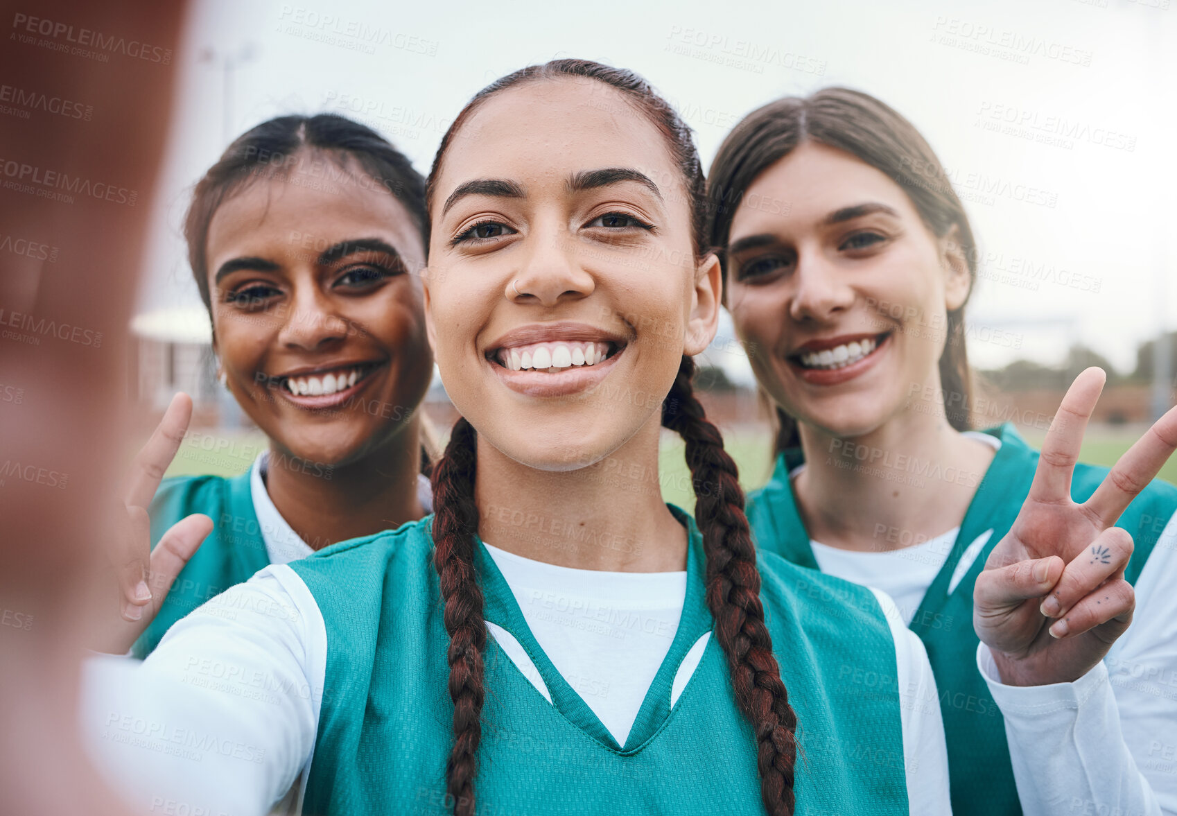 Buy stock photo Sports women, team selfie and peace sign on field for memory, competition and portrait for fitness. Girl group, photography and post on social media with emoji, v icon and diversity for hockey game