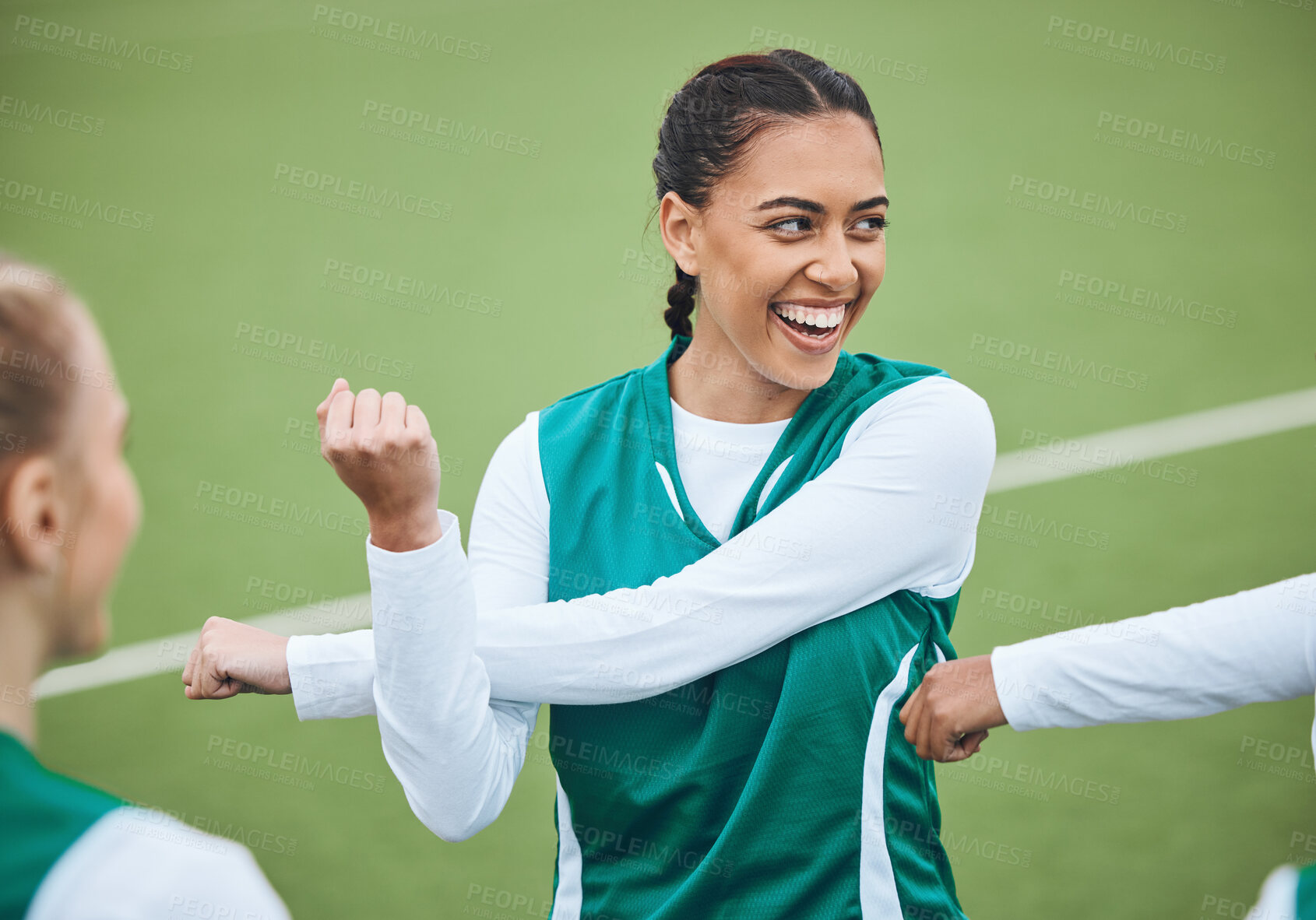 Buy stock photo Sports, athlete and stretching arms on field with soccer team, women and exercise with happiness outdoor. Football player, woman and training with a smile on face for fitness practice, match or game