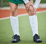 Sports, injury and legs of woman on field, grass or athlete walking with joint pain in soccer, accident or game. Medical, emergency and person with knee problem, ache or sore tendinitis and arthritis