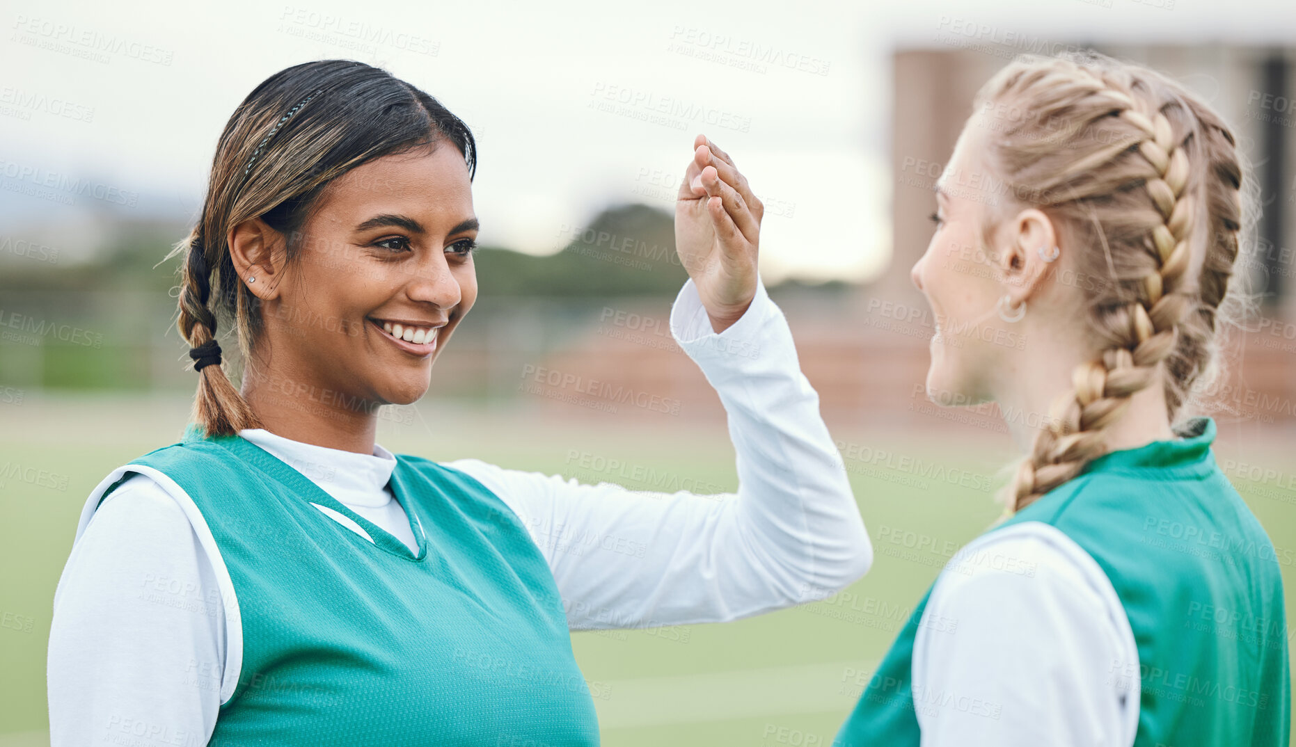 Buy stock photo Youth, teenager and girl with smile for sports with team, practice or match on field. Female, person or student with friend in excitement, happiness or joy for game, competition or training at school