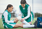 Sports, knee injury or woman with a bandage on field or turf struggling with pain in game or match. Fitness workout, medical first aid or female athlete on a field suffering from an accident outdoor