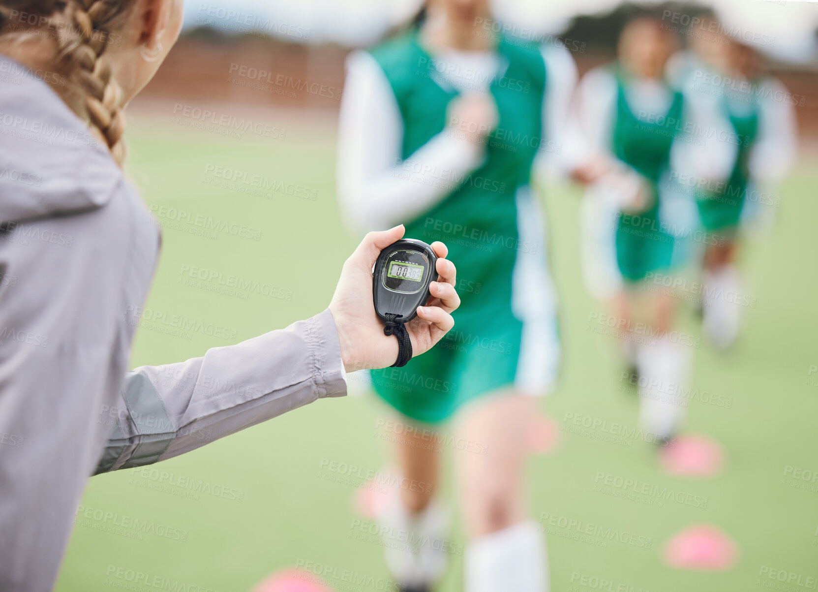 Buy stock photo Hands, coach or team with timer on field to monitor time, fitness training or exercise progress. Hockey, performance blur or fast sports athlete with stop watch to check running workout or wellness