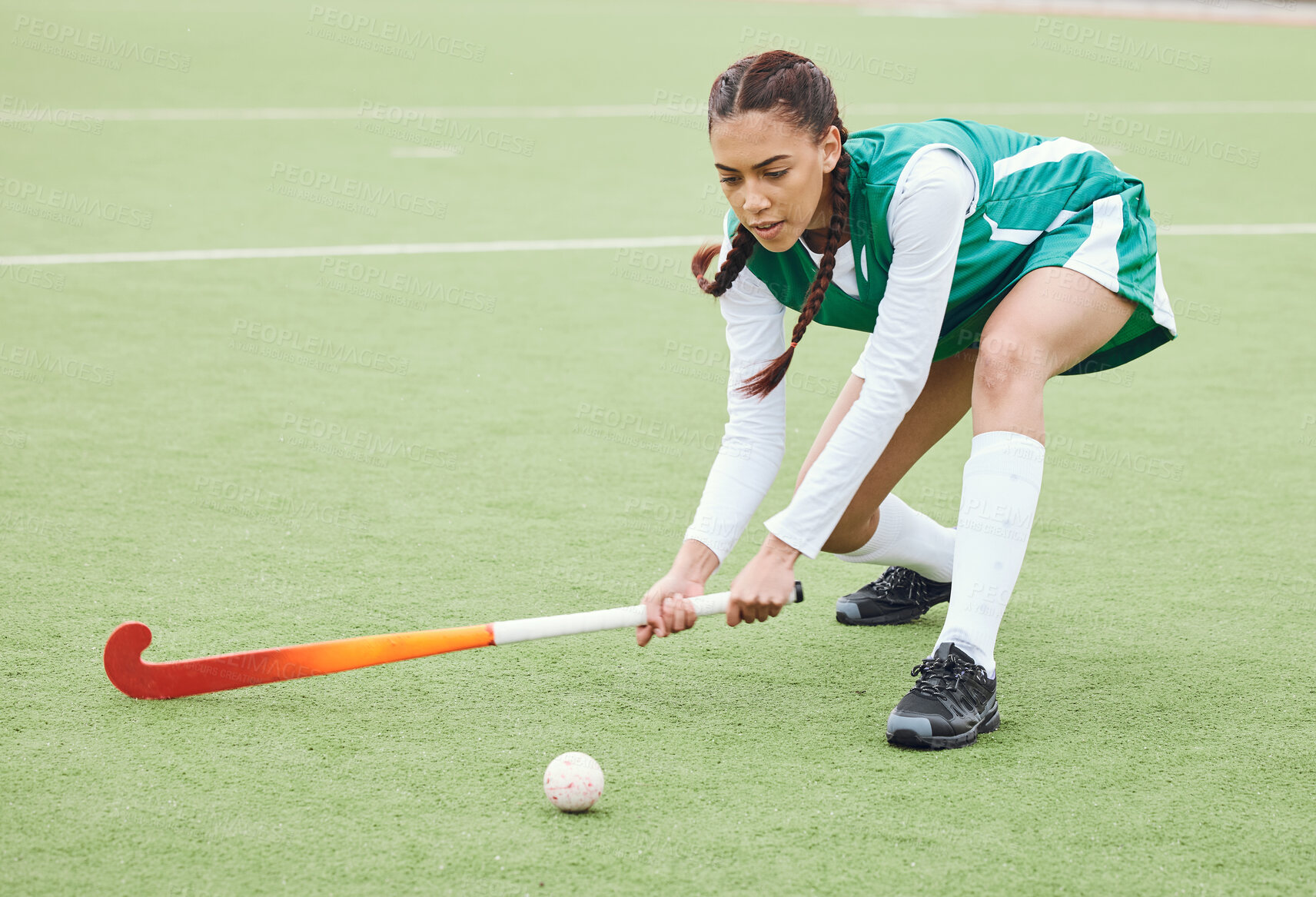 Buy stock photo Hockey, sports or woman on turf in fitness training, game or competition with ball, stick or action. Strong, athlete or fit girl player in exercise, workout or motion on artificial grass for power