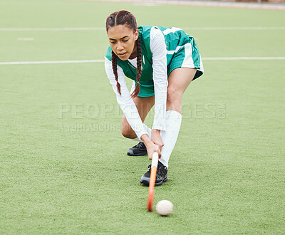 Buy stock photo Hockey, sports or girl on turf in fitness training, game or competition with ball, stick or action. Strong woman, athlete or female player in exercise, workout or motion on artificial grass for power