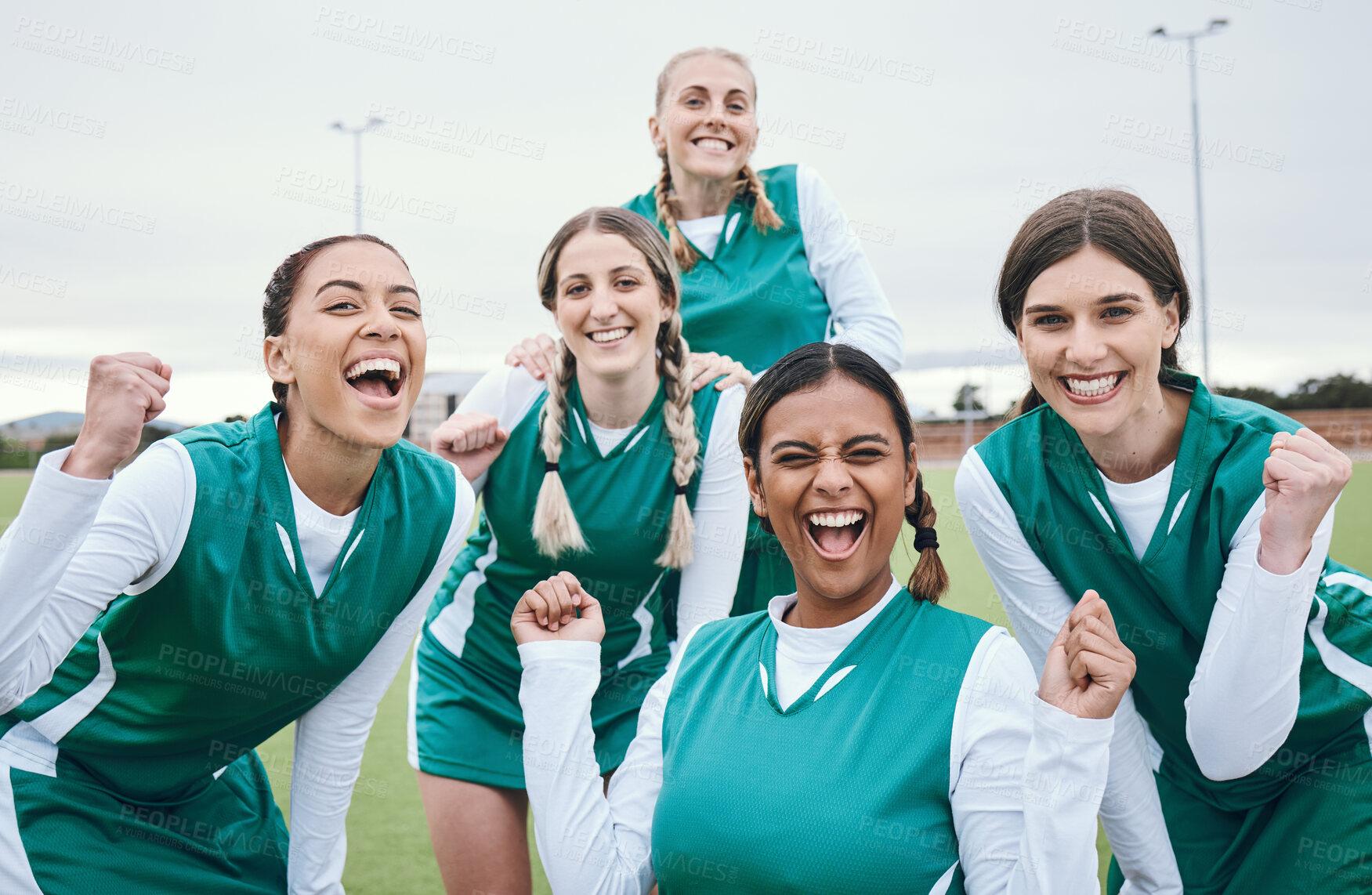 Buy stock photo Sports, field and portrait of happy woman with team, celebration and award winning at challenge. Diversity, hockey and excited group of women, winner at competition with smile and success at stadium.