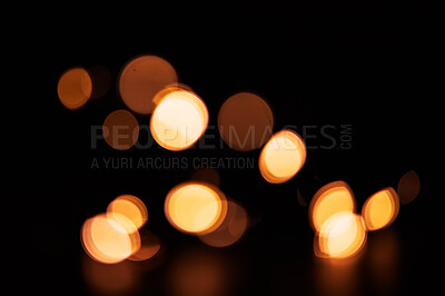 Buy stock photo Gold, bokeh and mockup with light on dark background for New Year, Christmas or festive fireworks celebration at night. Mock up, space or sparkle in winter with magic, glow or shine on black backdrop
