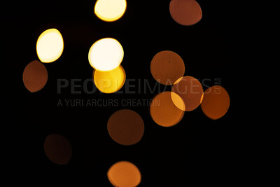 Buy stock photo Gold, bokeh and mockup with lights on dark background for New Year, Christmas or festive fireworks celebration at night. Mock up, space and star in winter with magic, glow or shine on black backdrop