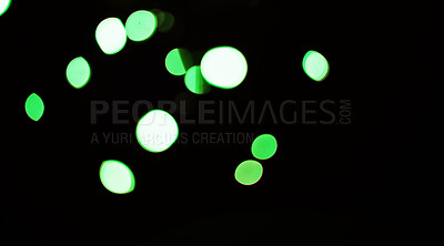 Buy stock photo Bokeh on a dark background, green dots and sparkle with mockup space, abstract or wallpaper with special effects. Texture, pattern and glitter, graphics with glow or shine, disco with bubble decor
