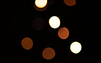 Gold, lights and bokeh on dark blurred background for New Year, Christmas or festive fireworks celebration at night. Mock up, space and sparkle in winter with magic, glow or shine on black backdrop