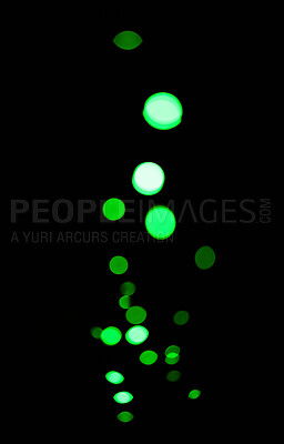 Bokeh, neon green lights on black background and dots with pattern, texture and mockup with cosmic aesthetic. Night lighting, sparkle particles and glow on dark wallpaper with space, shine and flare.
