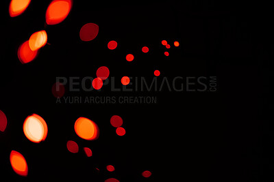 Buy stock photo Red, lights and bokeh in a studio with dark background for celebration, event or party. Confetti, glitter and color sparkles for magic, shine or glow for festive by black backdrop with mockup.