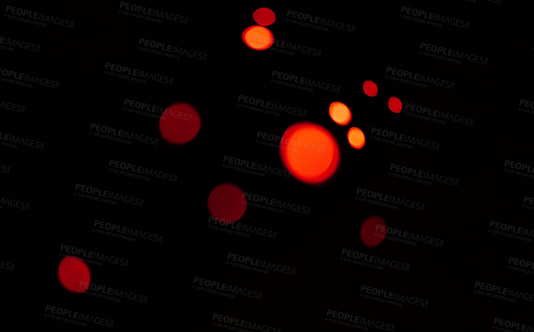 Buy stock photo Red, bokeh and light in a studio with a dark background for celebration, event or party. Mockup, sparkle and color for glow, magic or shine for festive decoration by a black backdrop with mock up.