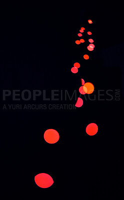 Bokeh, red lamp dots and black background with pattern, texture and mockup with cosmic aesthetic lights. Night lighting, sparkle particles and glow on dark wallpaper with space, color shine and flare