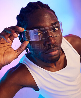 Buy stock photo Man, portrait and virtual reality sunglasses for futuristic fashion, designer brand and style in studio on neon background. Face of african person in trendy tech, VR vision and glasses in vaporwave