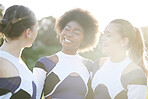 Cheerleader, sports and women on field smile for performance, dance and motivation for game. Teamwork, dancer and people in costume cheer for support in match, competition and sport event outdoors