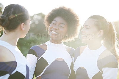 Buy stock photo Cheerleader, sports and women on field smile for performance, dance and motivation for game. Teamwork, dancer and people in costume cheer for support in match, competition and sport event outdoors
