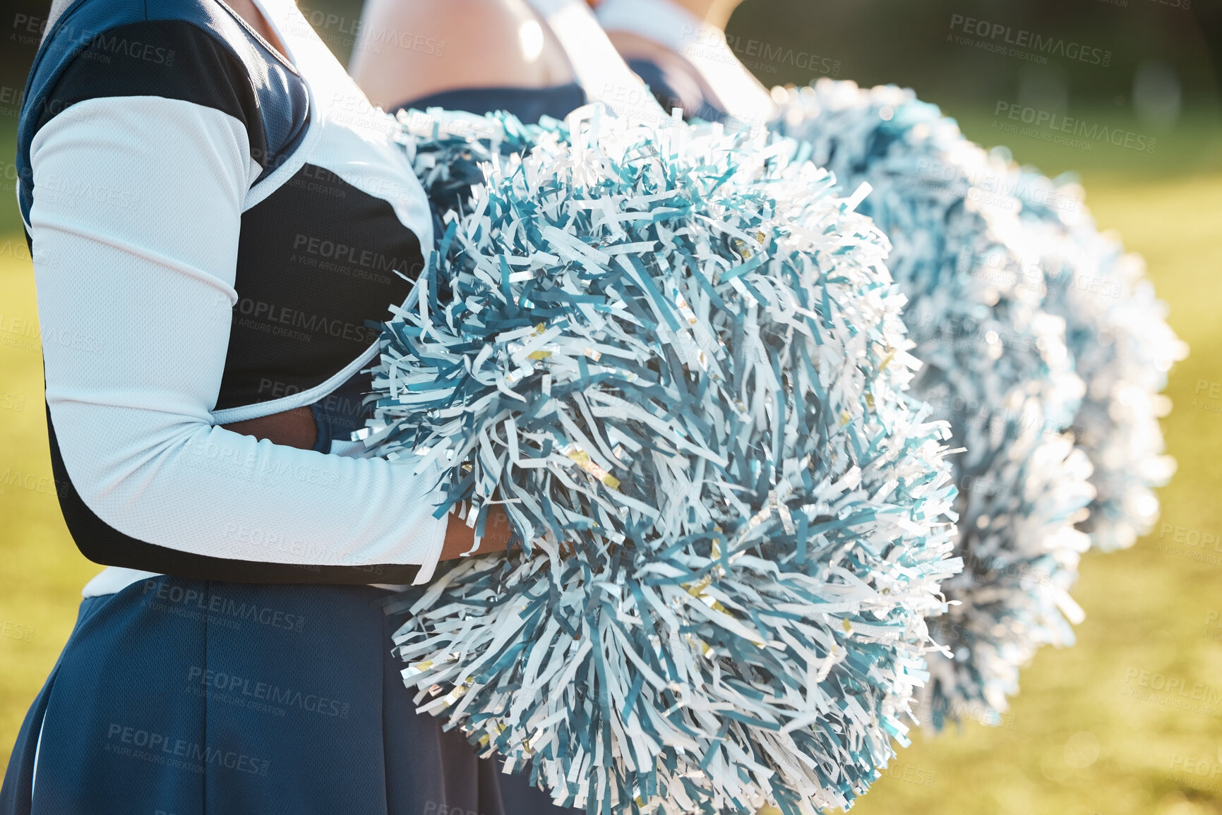 Buy stock photo Cheerleader team, sports and hands with pompom for dance, performance and motivation for game. Teamwork, dancer and people in costume cheering for support in match, competition and event outdoors